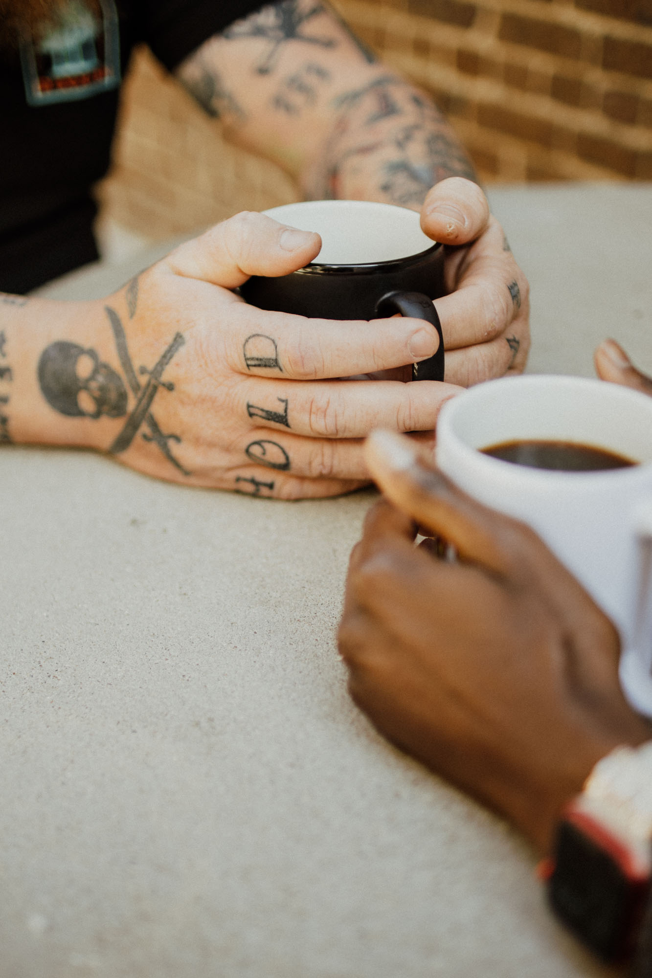 hands holding coffee symbolizing the comfort therapy can provide fort worth